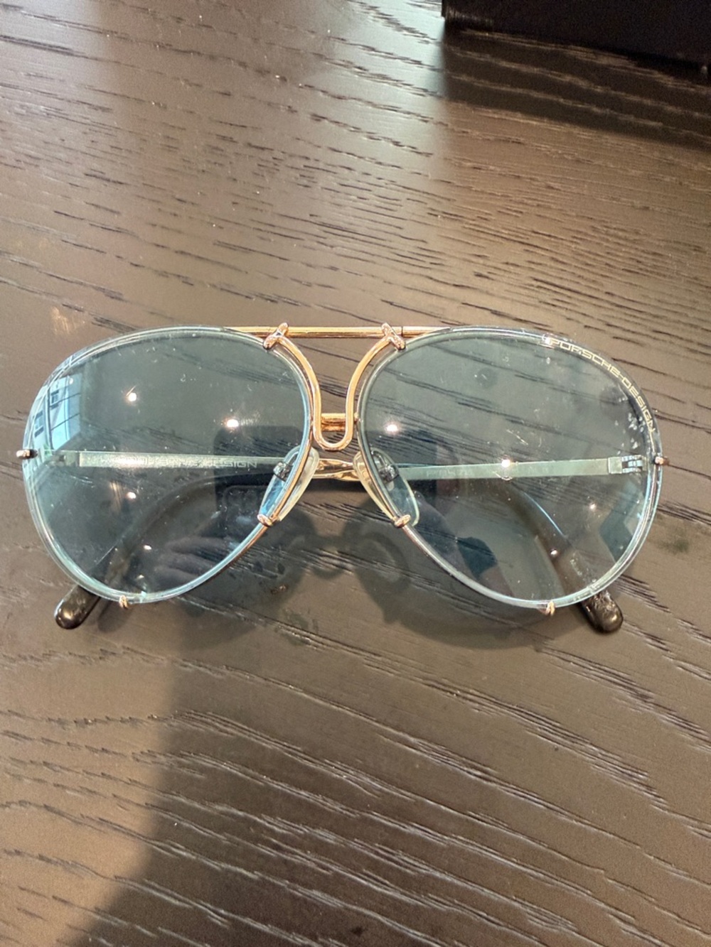 Porsche Design Aviator Sunglasses with Light Blue Lenses and Gold Frame
